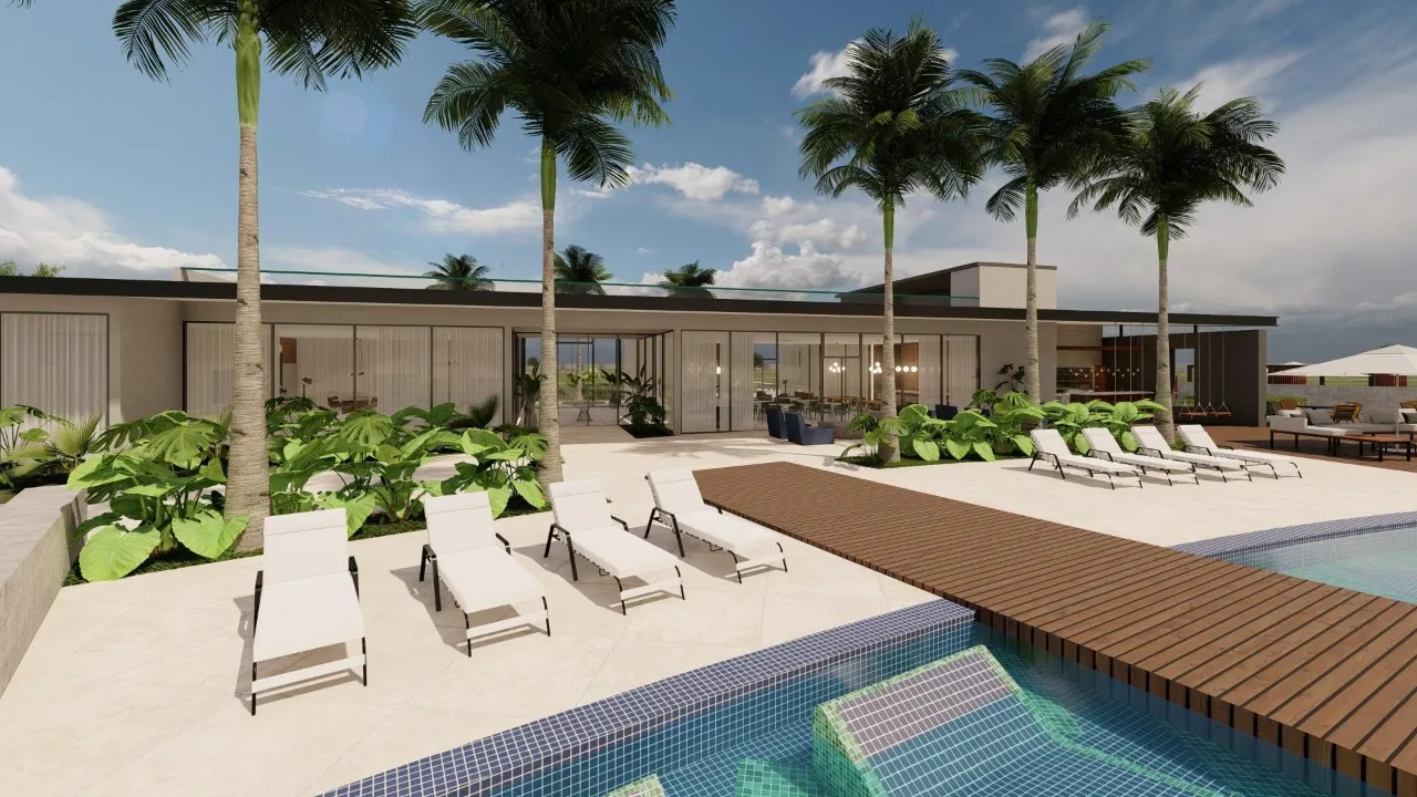 Deck de madeira e solário do clube do Allure Beach Condo com palmeiras