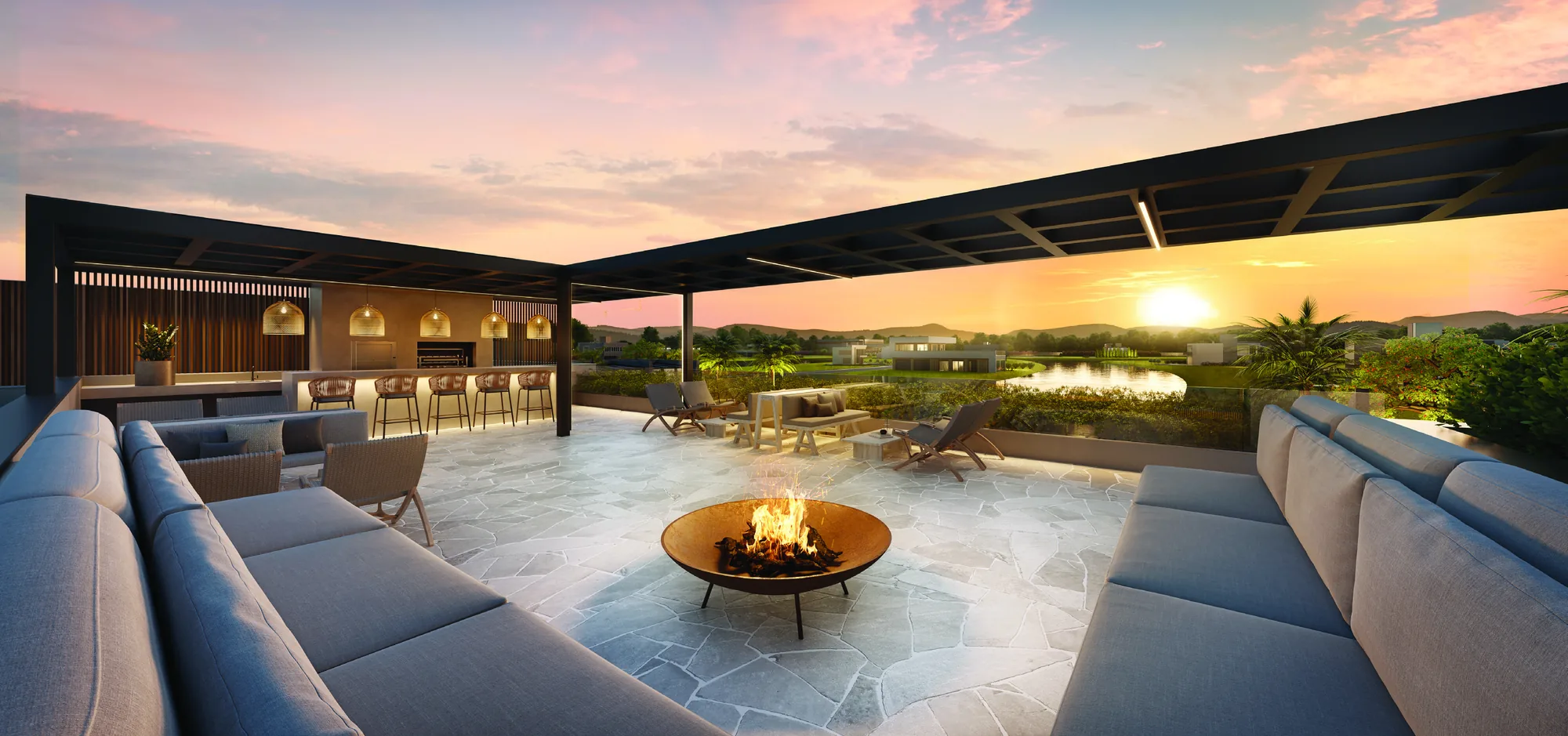 Rooftop com fire pit ao pôr do sol no clube house do AMARE Home Resort em Xangri-Lá