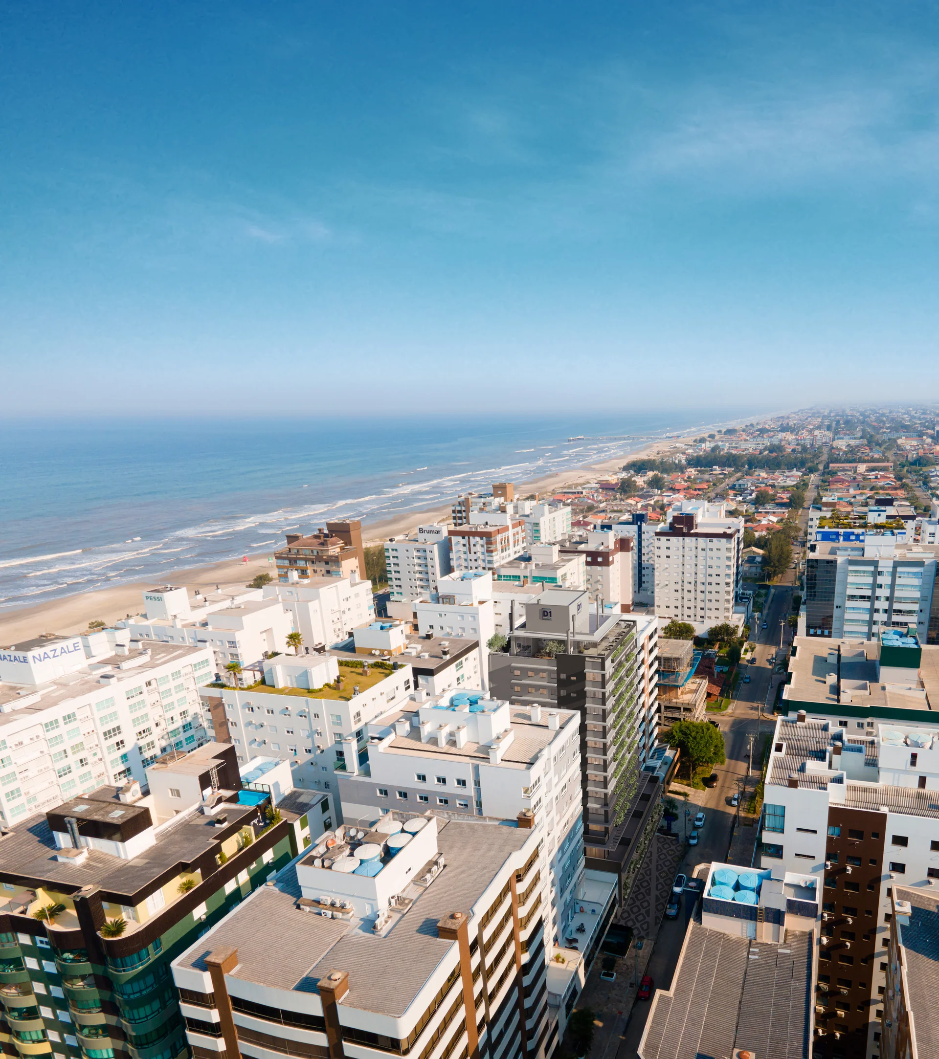 Fotomontagem aérea do Barcelona Smart Living inserido entre os prédios do bairro Navegantes, com a praia de Capão da Canoa ao fundo