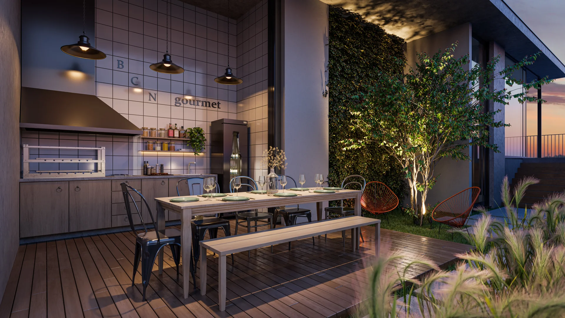 Gourmet externo do Barcelona Smart Living à noite, com churrasqueira, mesa comunitária e parede verde