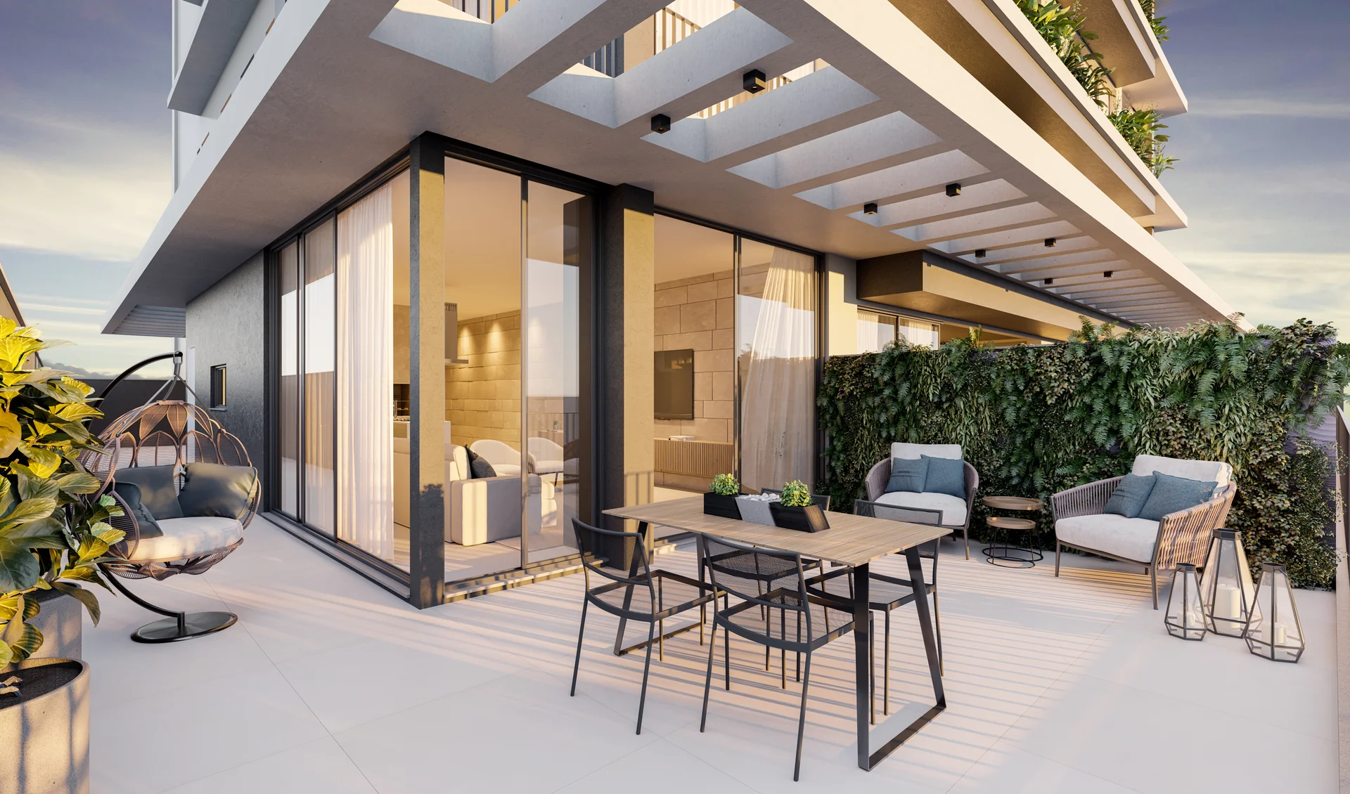 Terraço amplo de apartamento garden do Barcelona Smart Living com pergolado, parede verde e mesa externa