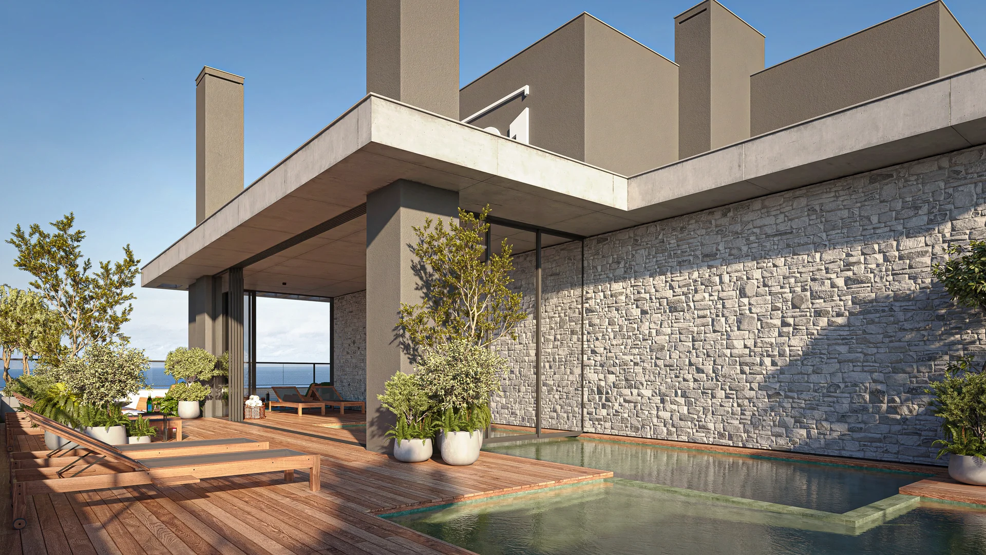 Piscina do rooftop do Cascais Soft Living com deck de madeira e parede de pedra