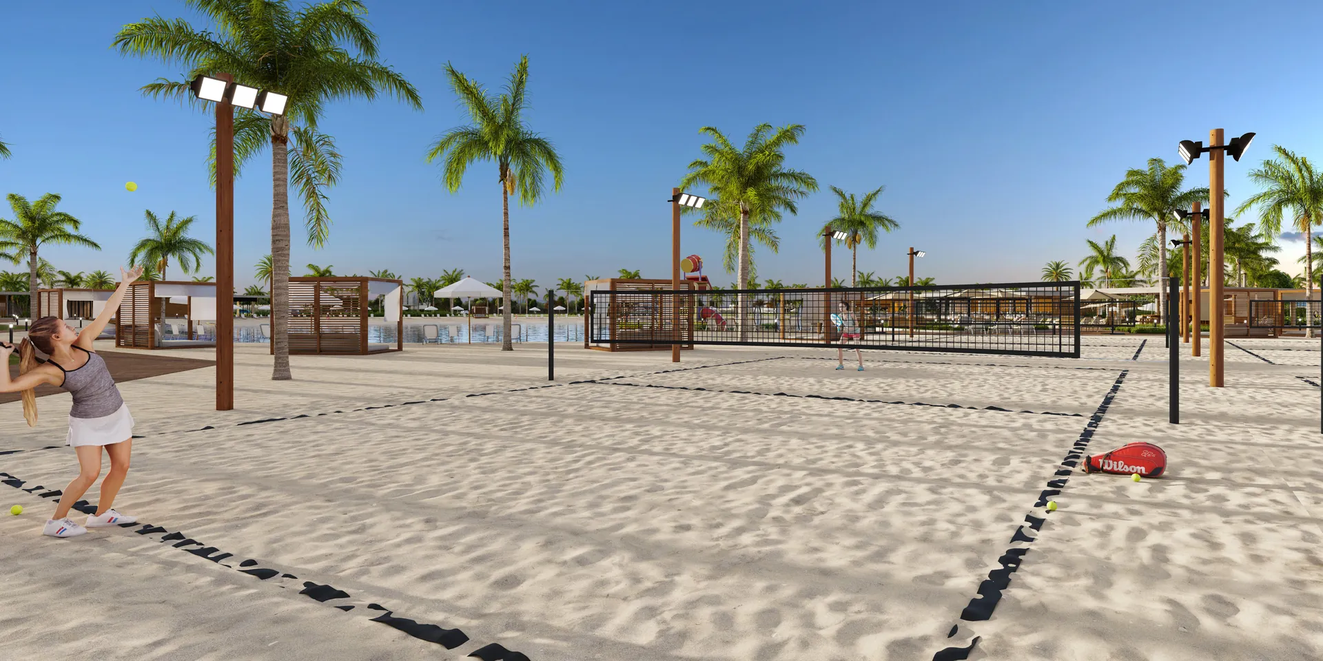 Quadras de beach tennis na orla do DUO Nautic Life Club com a lagoa ao fundo