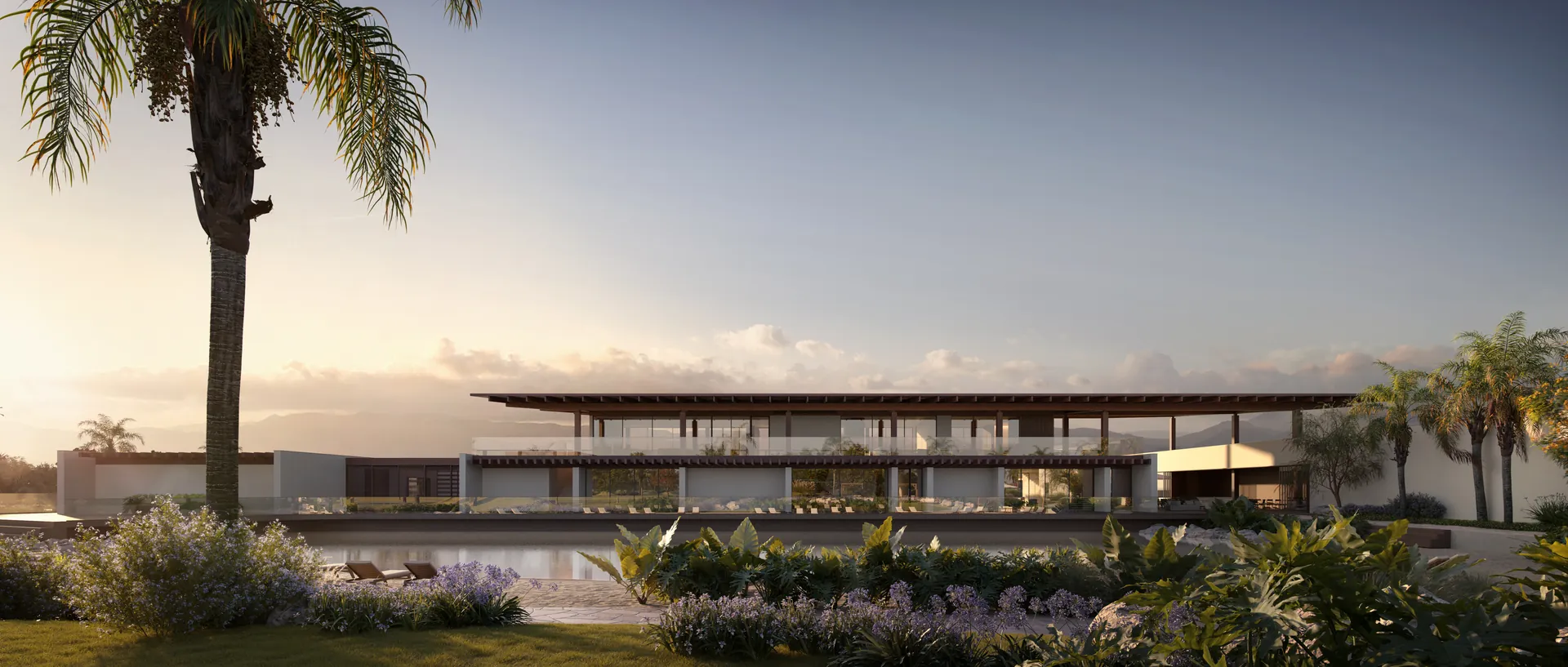 Casa clube de linhas modernas ao entardecer, com espelho d'água e jardins floridos em primeiro plano, Enseada da Lagoa em Capão da Canoa