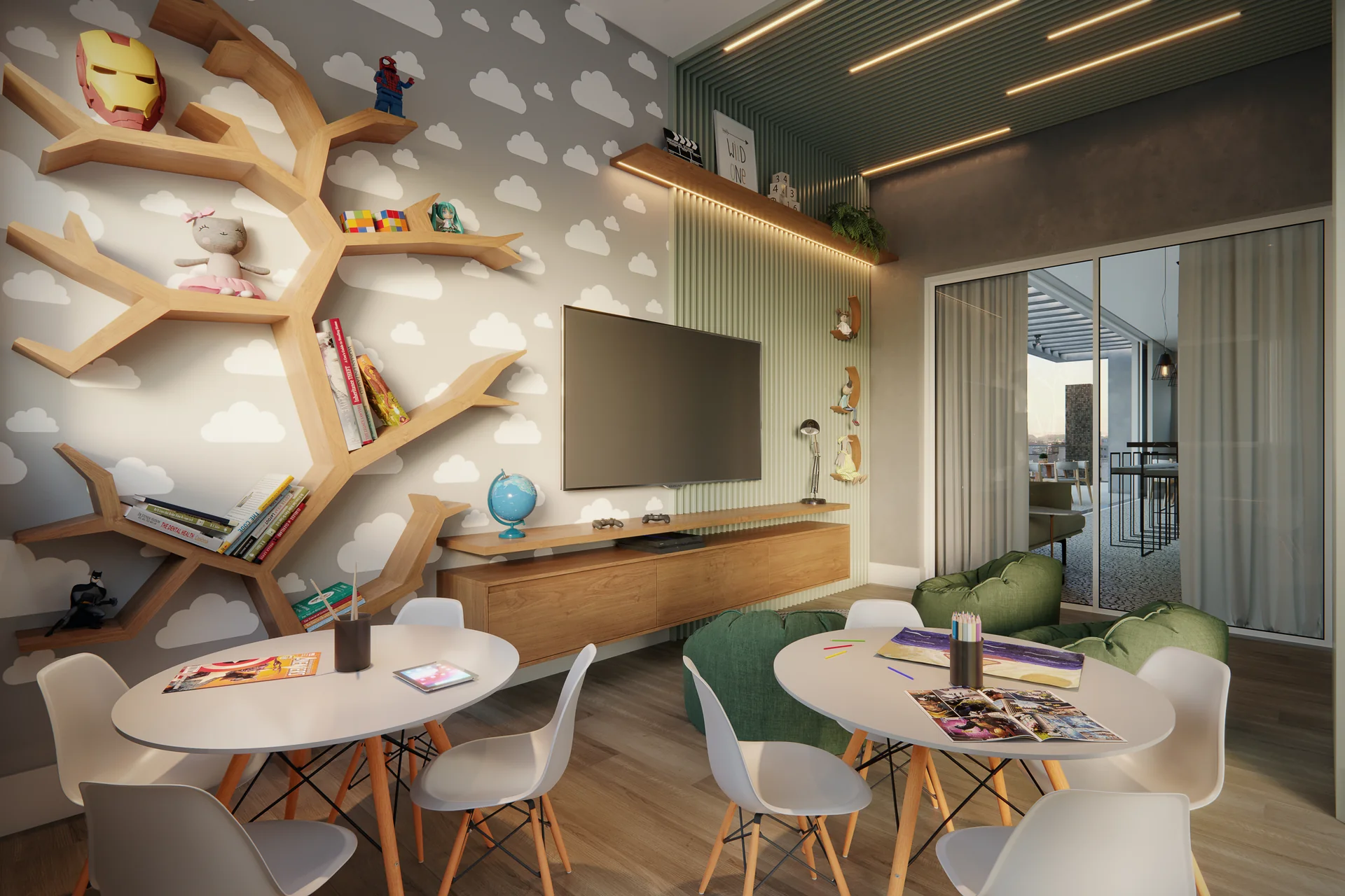 Espaço kids do Epic Residence com estante temática e mesas de atividades
