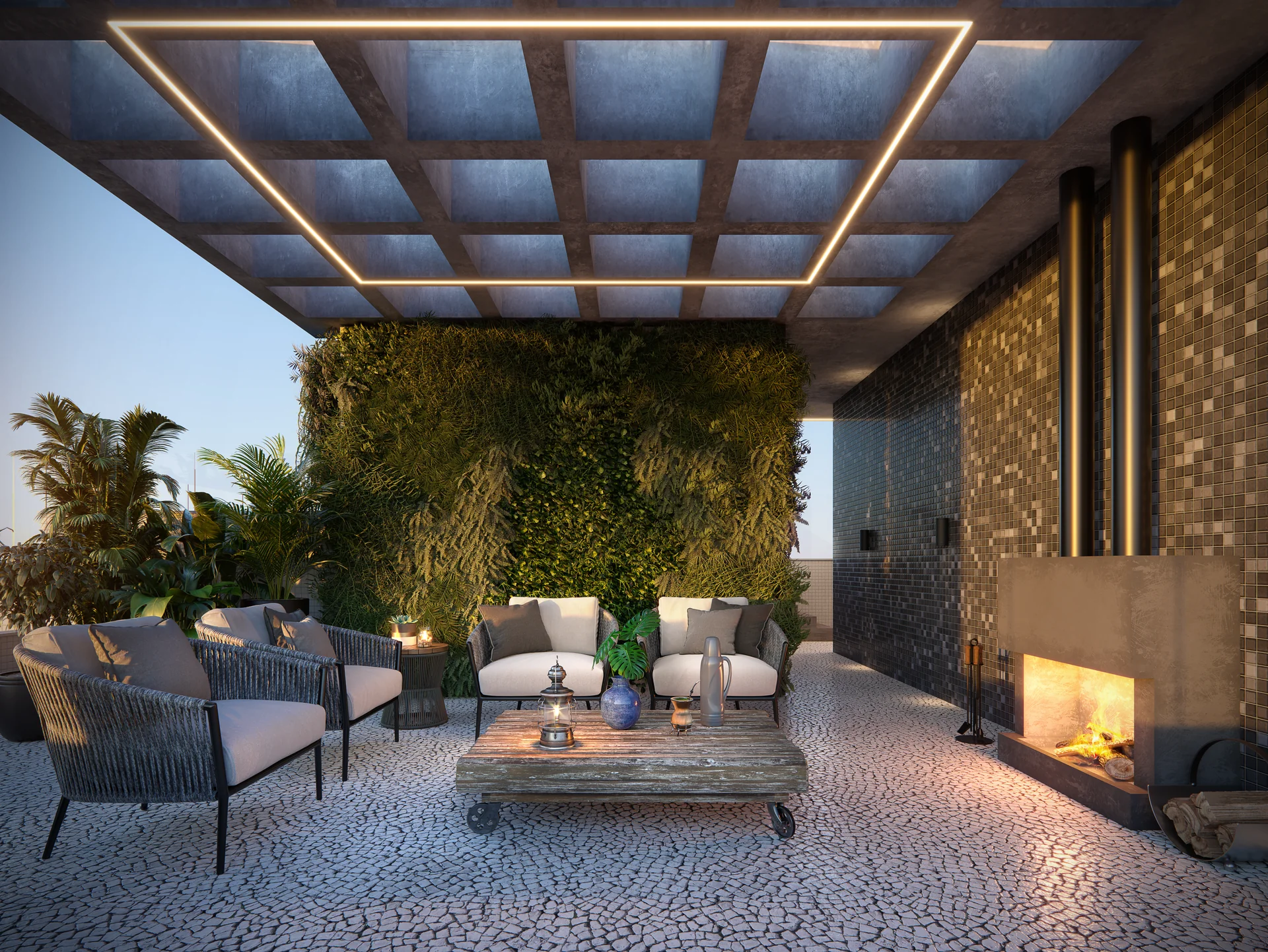 Lounge coberto por pergolado com lareira na cobertura do Felicitá Residence, ao entardecer