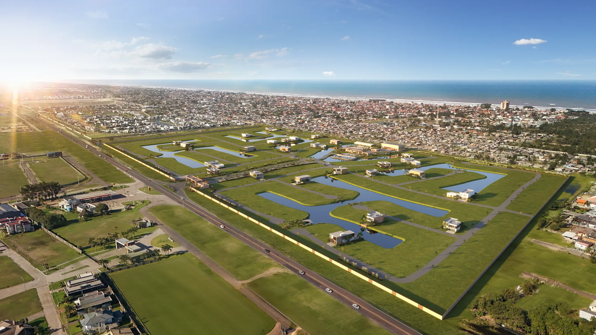 Vista aérea do condomínio Península com lagos internos, quadras de lotes e a orla ao fundo