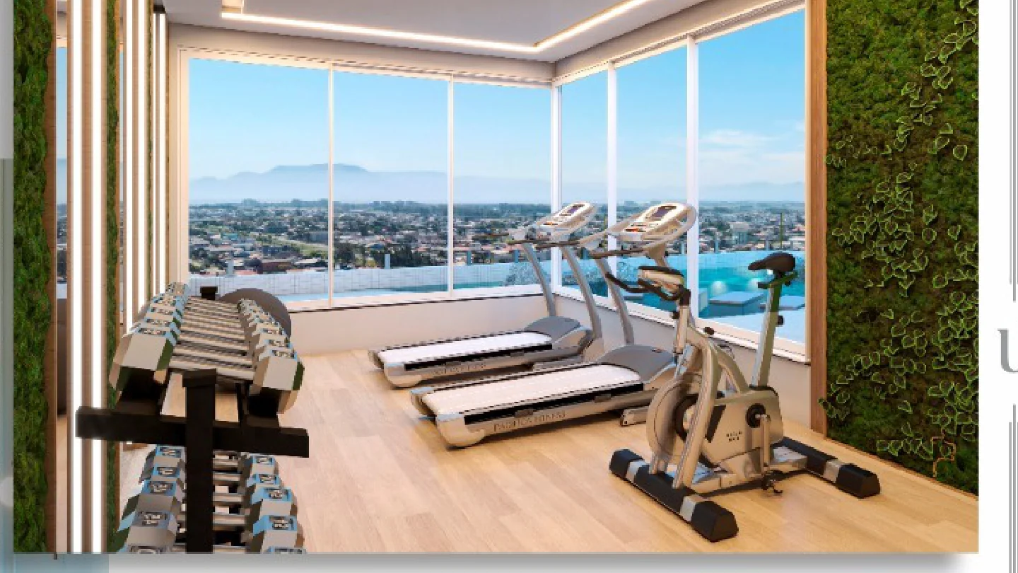 Espaço Fitness do Único Residence com esteiras, bike e vista panorâmica