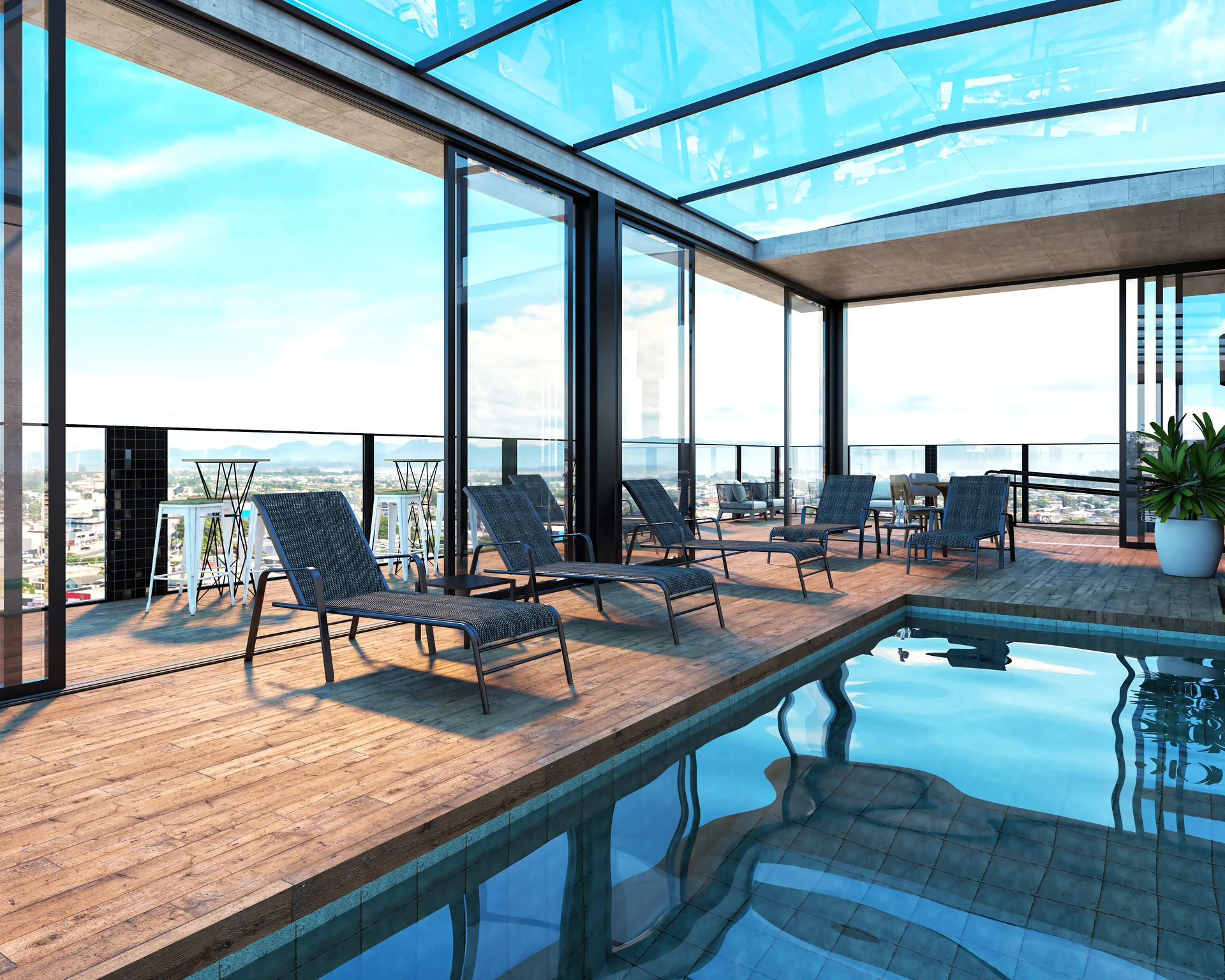 Deck e espreguiçadeiras junto à piscina do rooftop do VID Home & Club