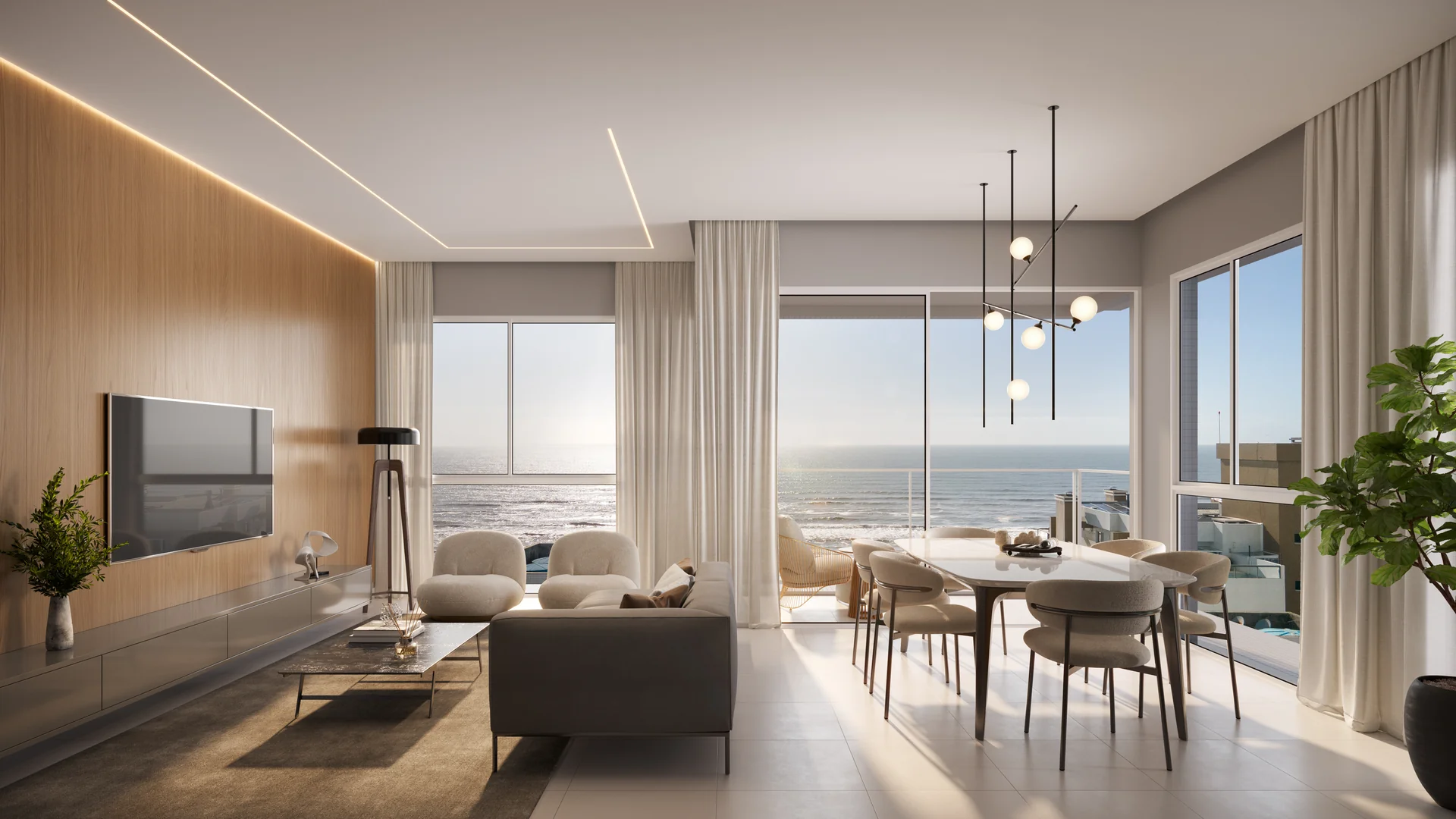 Living do apartamento 1301 do Vivaz Residence, com ilha de cozinha, mesa de jantar e o mar visto pela sacada, unidade de 4 suítes no 13º pavimento